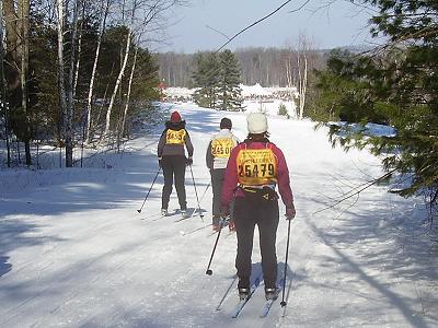 skiers with finish is sight