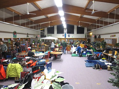 Birkie Patrollers claim spaces to sleep in the Hayward Middle School Library