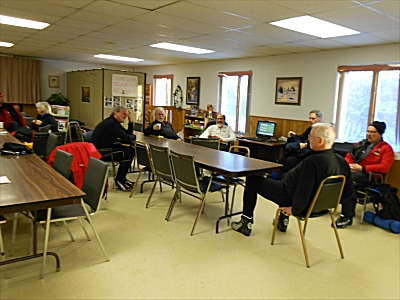 Patrollers waiting in Senior center for their bus to arrive.